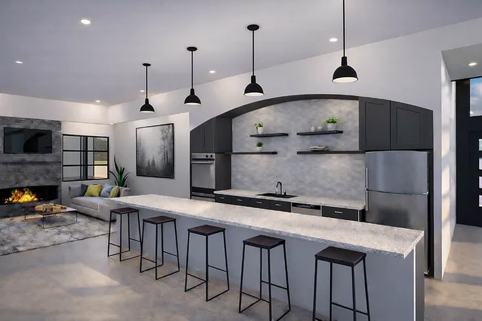 Modern open-concept kitchen and living area featuring sleek countertops, stylish pendant lighting, and a cozy fireplace.