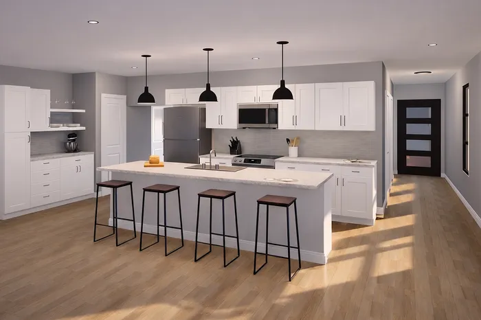 Modern kitchen with sleek white cabinetry, island seating, and stainless steel appliances, illuminated by stylish pendant lighting.