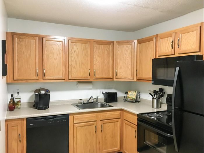 Kitchen | Black Appliances | Eastview Apts