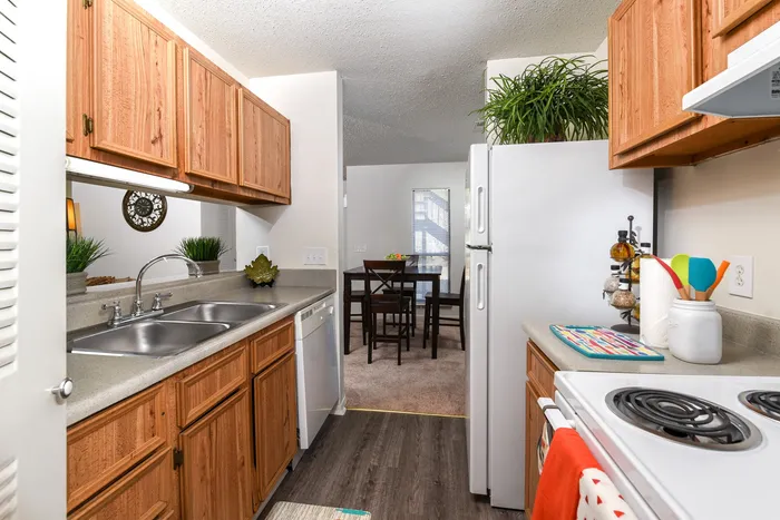Two Bedroom Kitchen | Wood Cabinets | Vinyl Plank Flooring
