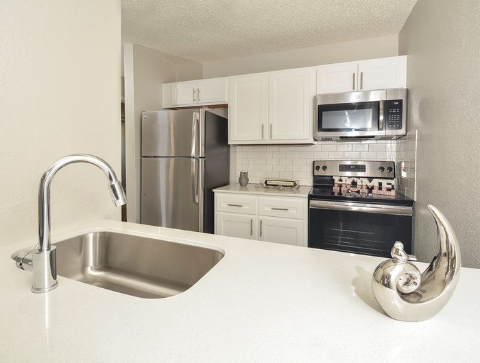 Updated kitchen | Stainless steel appliances | white cabinets