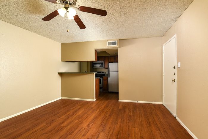 A1 Kitchen open into the living area | Wood Plank flooring