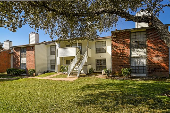 Exterior of building | White siding with Brick | 2 stories high
