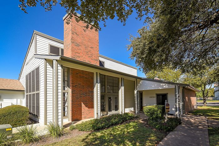 Leasing office | white with brick facade for fireplace