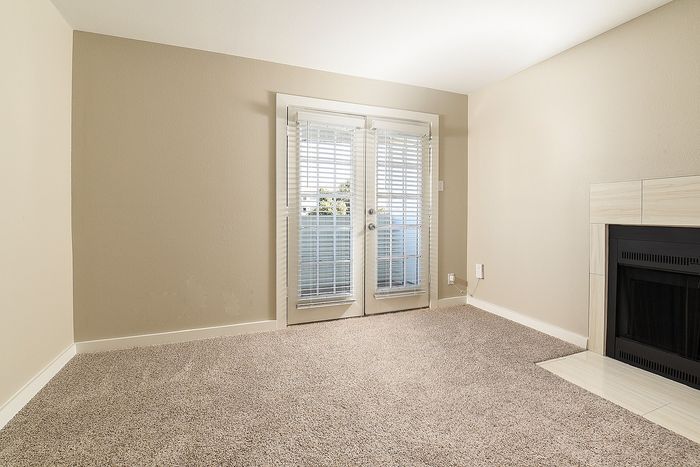 Designer home | One Bedroom | French doors | fireplace | carpet
