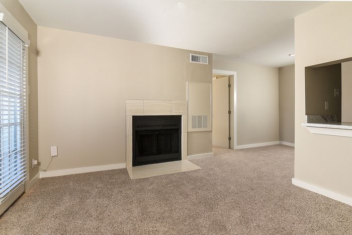Designer home | One Bedroom | fireplace | carpet