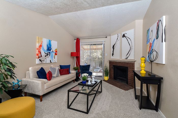 B Floor plan | Living room with brick fireplace and Vaulted ceilings | Carpet