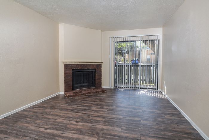 C floorplan | Fireplace | Plank Flooring | Sliding glass door