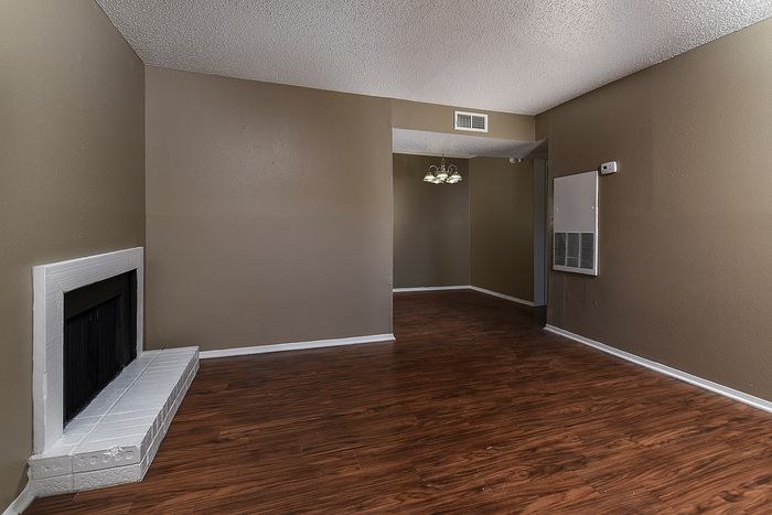 Living area | plank flooring | Fireplace