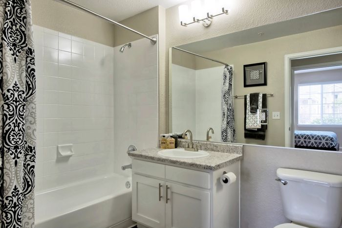 Bathroom with Large Vanity and Tub