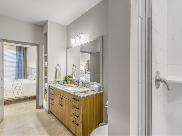Bathroom with luxurious deep tub at Solis City Park apartments for rent in Charlotte, NC
