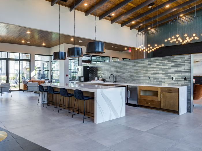 Clubhouse with ample seating at Solis City Park apartments for rent in Charlotte, NC