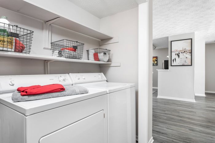 Full size in-unit washer and dryer at Pointe at Canyon Ridge apartments for rent in Atlanta, GA