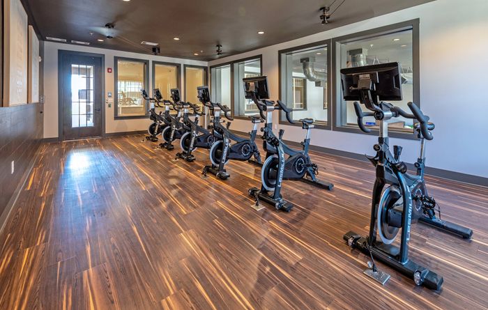 Spin Class Room with Bikes and Large Windows