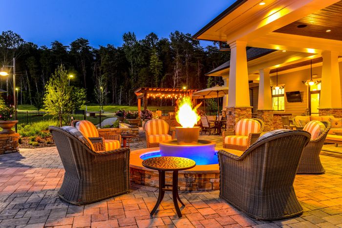 Poolside Fire Pit Lit at Night