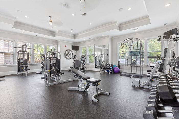 24-hour fitness center with cardio, strength training and free weights at St. James at Goose Creek apartments for rent