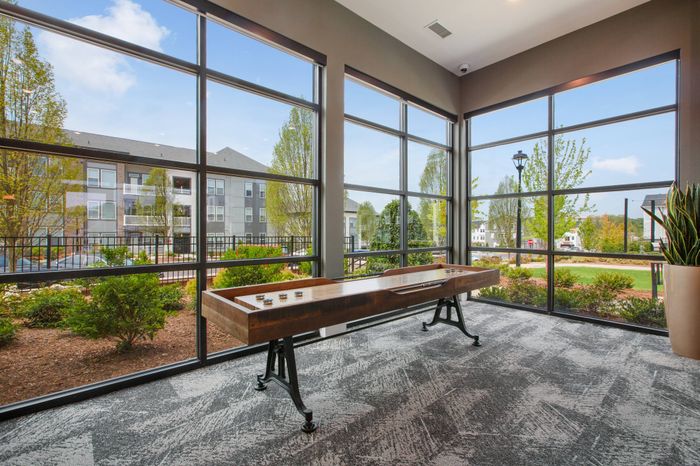 Shuffleboard table in community game room