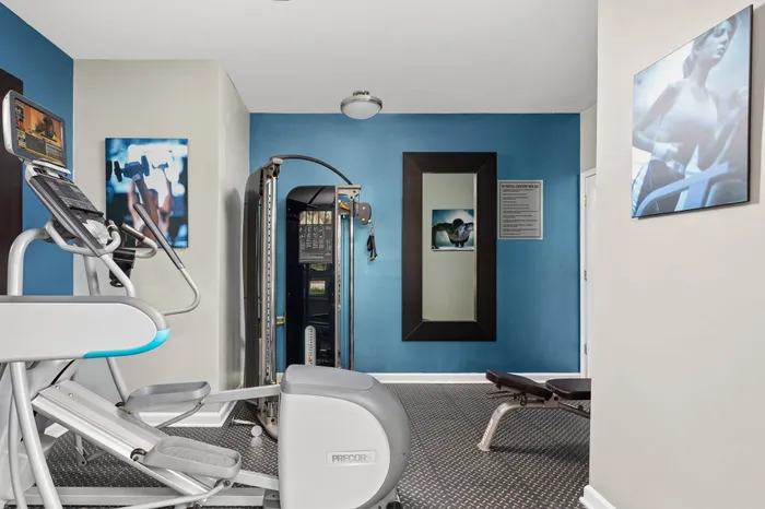 Cardio and weight resistance machines in Memphis apartment fitness center