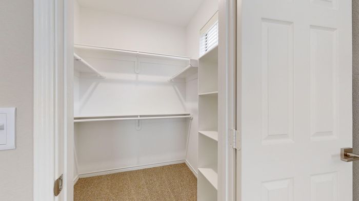 Walk-In Closet with Built-In Storage