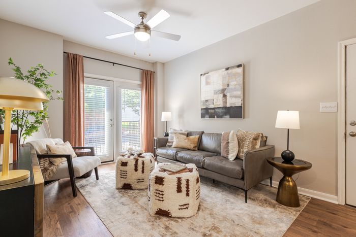 Newly Renovated Living Room with Hardwood-Style Flooring