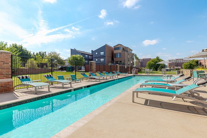 Sparkling Swimming Pool with Sundeck