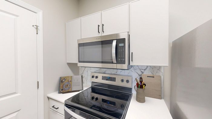 Newly Renovated Kitchen with Quartz Countertops