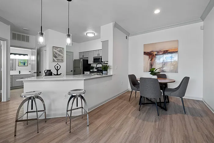 Kitchen and dining room with wood floors