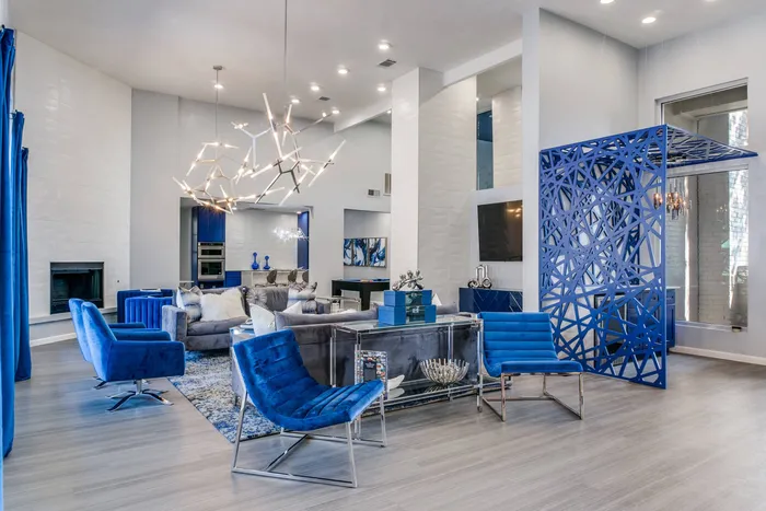 Leasing office with desk and blue chairs