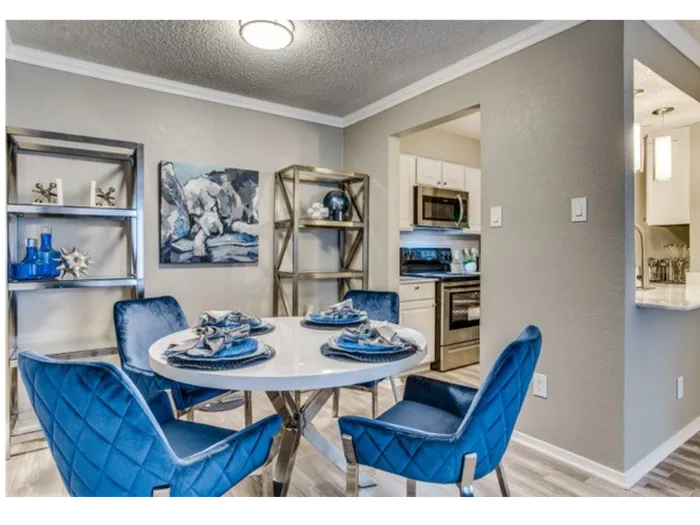 Dining table and chairs, and bookshelves