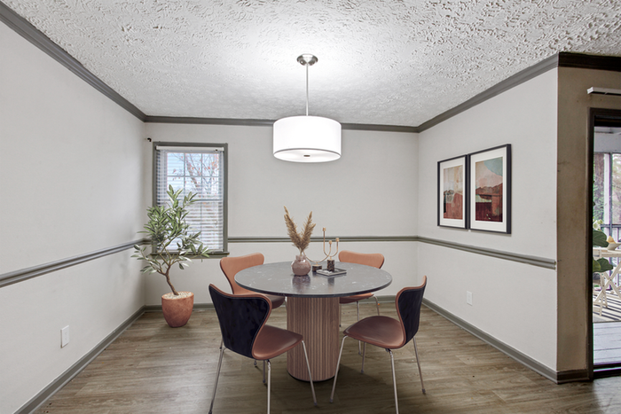 Virtual staging of dining room with hardwood floors