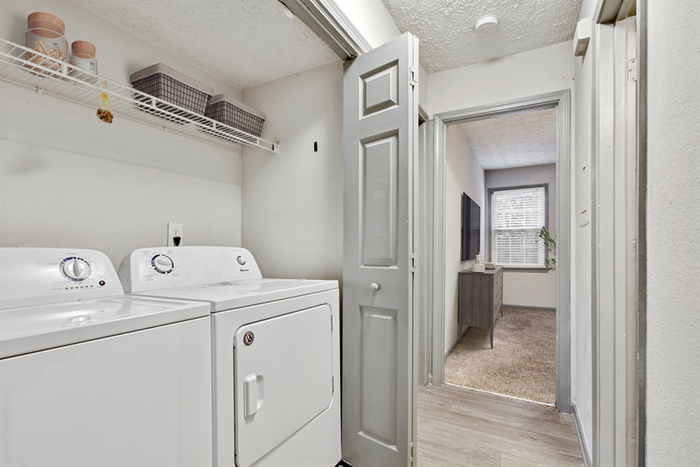 Virtual staging utility room with washer and dryer