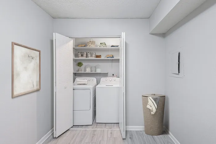 Utility room with full size washer and dryer