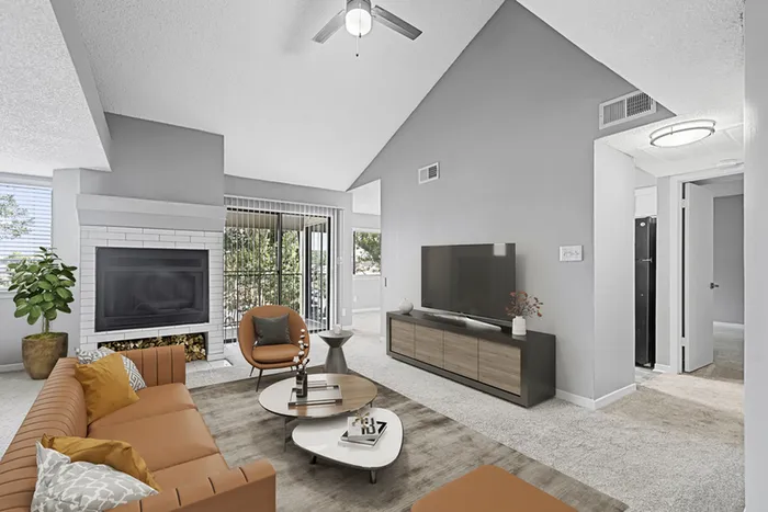 Living room with ceiling, TV, table and chairs
