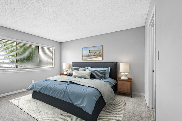 Bed, side table and window