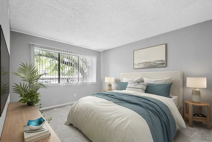 Bed with window and wall art