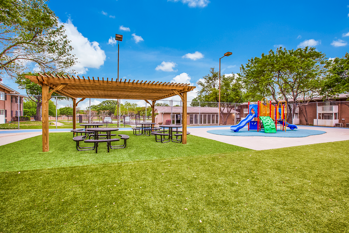 community exterior covered seating area, playground