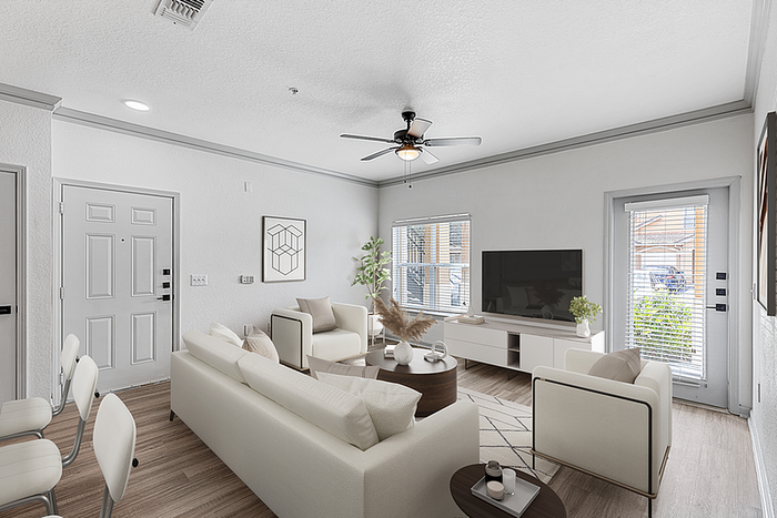 Bright and modern living room with sleek furniture, large windows, and stylish decor, perfect for relaxation and entertainment.