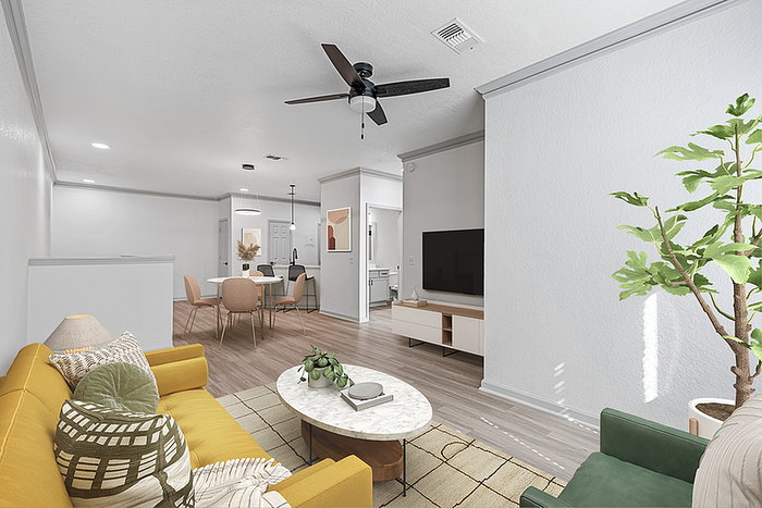Bright and inviting open-concept living area with modern furnishings, featuring a cozy yellow sofa, sleek coffee table, stylish dining space, and abundant natural light.
