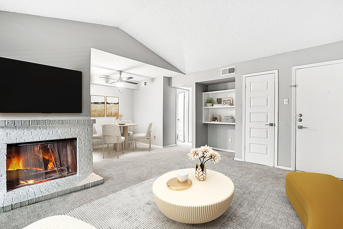 Charming living space with a cozy fireplace, modern decor, and an elegant dining area. Perfect for relaxation and entertaining.