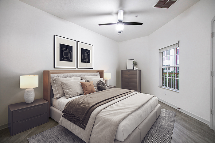 Bright and inviting bedroom featuring modern decor with stylish artwork, elegant lighting, and a cozy atmosphere.