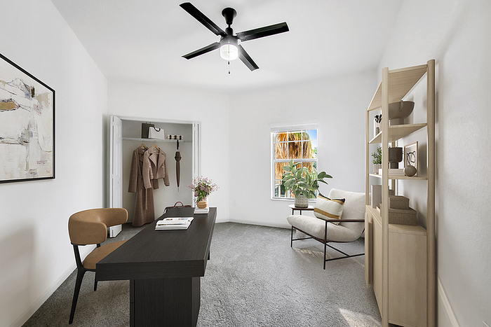 Contemporary home office with sleek desk, comfortable chairs, and a bright window view, perfect for productivity and inspiration.