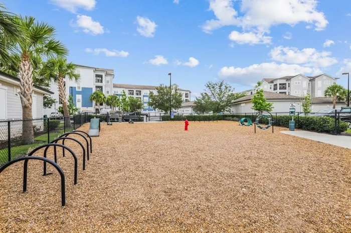 Pet Park with running space and obstacle course at Lantower Asturia Apartments.