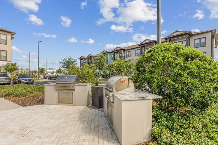 Grilling station with stainless steel, gas grills at Lantower Grande Flats Apartments