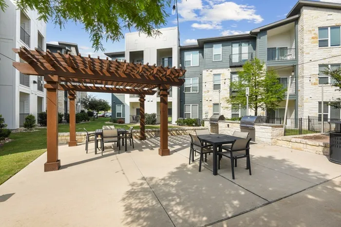 Resort style grilling and barbeque area with plenty of space for seating, eating, and outdoor activities at Lantower Techridge
