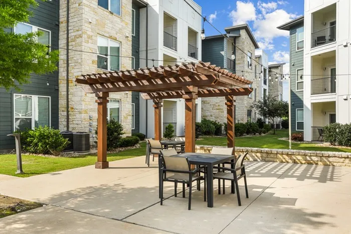 Resort style grilling and barbeque area with plenty of space for seating, eating, and outdoor activities at Lantower Techridge
