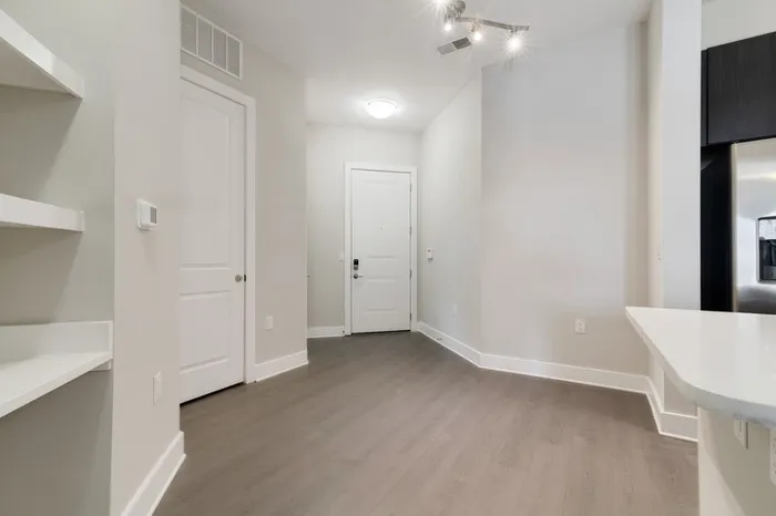 An apartment entrance with 10-12-foot ceilings at Bullhouse.