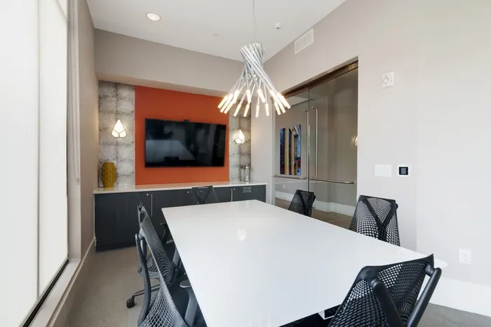 Business center equipped with a conference room style arrangement at Lantower Bullhouse.
