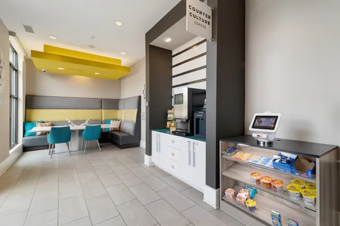 Self-serve coffee bar and seating area at Lantower Bullhouse.