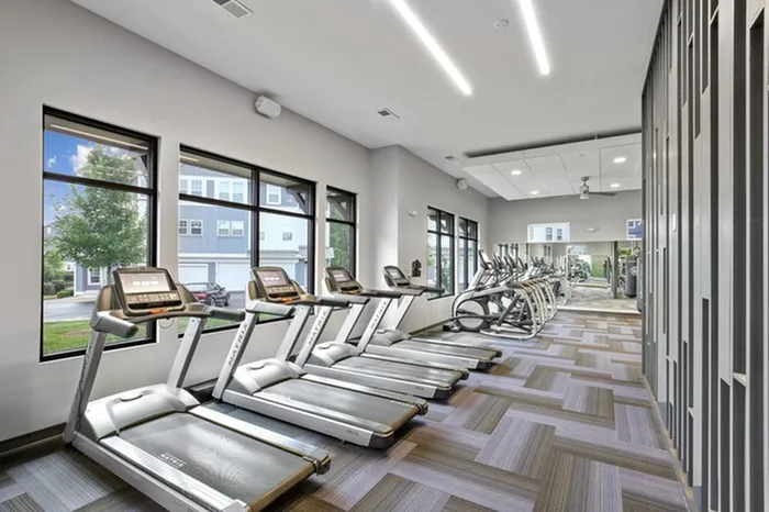 Spacious and clean 24-hour gym with weights and fitness machines at Lantower Garrison Park.