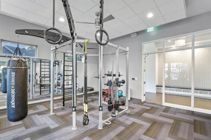 Spacious and clean 24-hour gym with weights and fitness machines at Lantower Garrison Park.